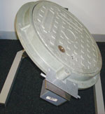 GLAM Lock installed for access control on a telecoms manhole cover.